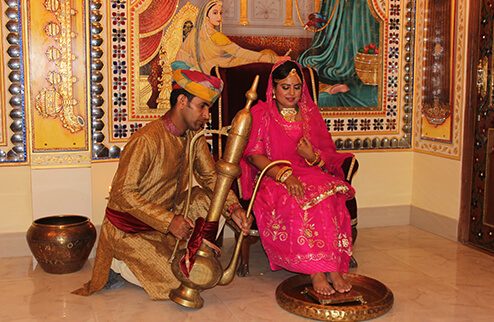 Traditional feet-wash welcome ritual for guests at Virasat Heritage Restaurant Jaipur